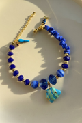 Bracelet bleu avec Motif Poisson – Élégance et Porte-Bonheur